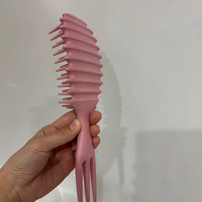 Brosse-à-cheveux-bouclés-rose-accessoire-capillaire-style-pratique-demelage-coiffure-soigne