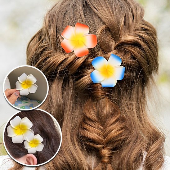 Pince-à-cheveux-fleur-orange-plumeria-fixee-sur-tresse-cheveux-longs-style-tropical