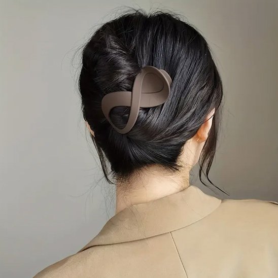 Pince-à-cheveux-forme-infini-brun-coiffure-chignon-femme-style-elegant-minimaliste