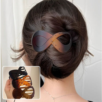 Pince-à-cheveux-forme-infini-degrade-ambre-chignon-femme-style-elegant-moderne