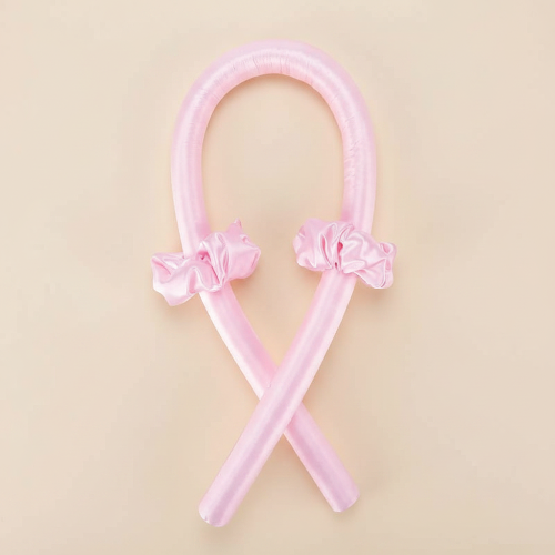 Bigoudis rose fond beige