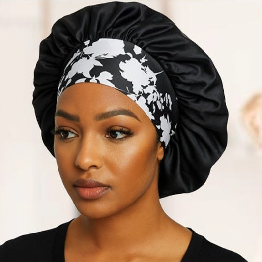 bonnet-de-nuit-en-satin-noir-bande-fleurie-protection-cheveux-douceur-confort-style-elegant