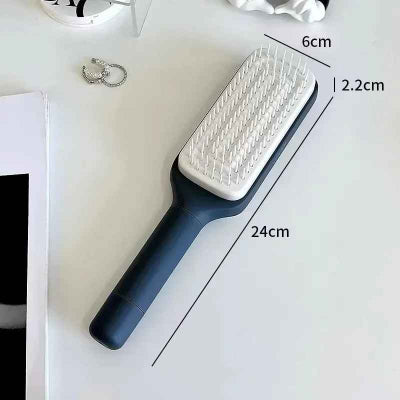 brosse-à-cheveux-grise-sur-un-fond-blanc