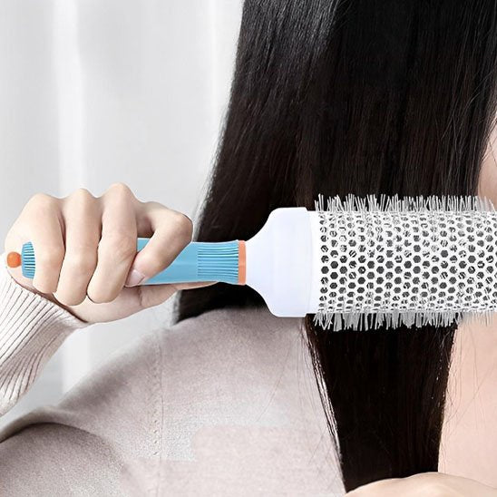 brosse-cheveux-boucles-ronde-coiffure-volume-soin-capillaire-anti-frisottis-ergonomique