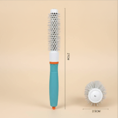 brosse-cheveux-boucles-ronde-fond-uni