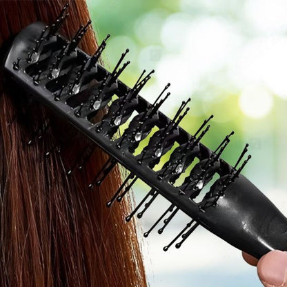 Brosse cheveux bouclés  noire sur des cheveux long