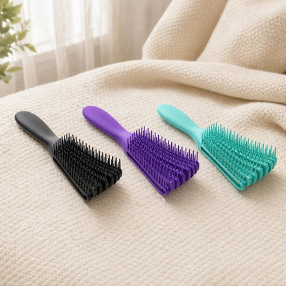 Brosse cheveux boucles trois coloris noir violet turquoise