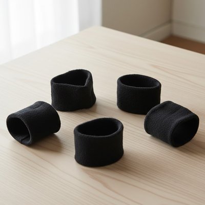 élastique bandeau cheveux tissu noir cylindres accessoires coiffure table